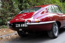 Image result for Maroon 1962 Jaguar