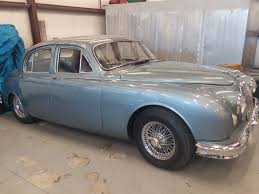 Image result for Silver Gray 1959 Jaguar
