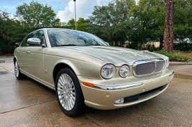 Image result for Winter Gold Pearl 2007 Jaguar
