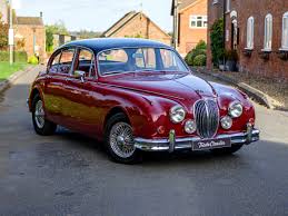 Image result for Burgundy 1983 Jaguar