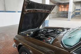 Image result for Carriage Brown 1977 Jaguar