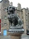 Greyfriars Bobby. William Brodie's bronze statue of 1873, on a drinking - via Daymix