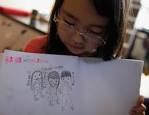 Wakana Kumagai, 7, holds her