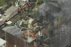 US jet crashes into apartment complex | Otago Daily Times Online ...