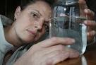 Water woes: Danielle Diamond next to a jar of fluoridated water from the tap ... - 5080004