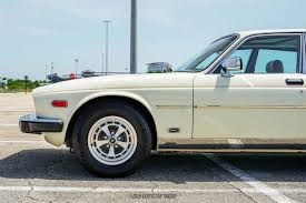 Image result for Nimbus White 1987 Jaguar