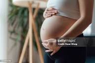 62,900 Of Pregnant Belly Stock Photos, High-Res Pictures, and ...