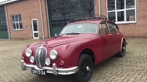 Image result for Maroon 1962 Jaguar