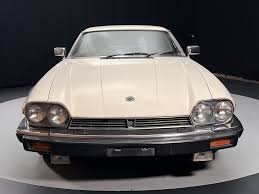 Image result for Nimbus White 1987 Jaguar