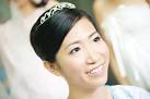 Hwee Ping The bride with crown and high bun for the hair. - 5481080789_9f04f41cab_z