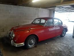 Image result for Maroon 1962 Jaguar