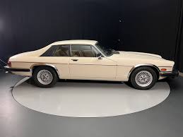 Image result for Nimbus White 1987 Jaguar