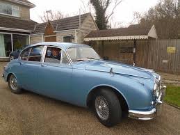 Image result for Silver Blue 1959 Jaguar