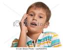 Stock Images of Serious kid talking over the phone - A handsome ... - can-stock-photo_csp4553915