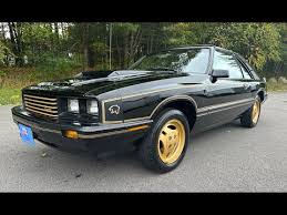 Image result for Maraschino Black 1981 Jaguar
