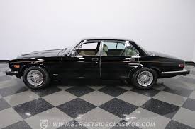 Image result for Poseidon Dark Green 1985 Jaguar