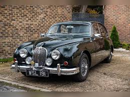 Image result for Carriage Brown 1977 Jaguar