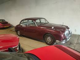 Image result for Maroon 1962 Jaguar
