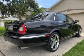 Image result for Black Cherry 2006 Jaguar