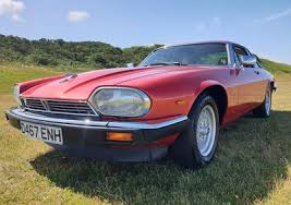 Image result for Sebring Red 1986 Jaguar