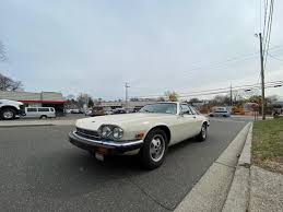 Image result for Nimbus White 1987 Jaguar