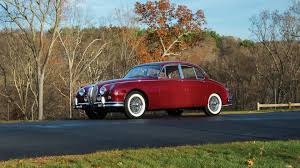 Image result for Maroon 1962 Jaguar