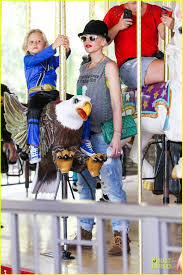 Image result for Queen B by Bumbleride $428 Gwen Stefani and Gavin Rossdale with Kingston and Zuma at the LA zoo