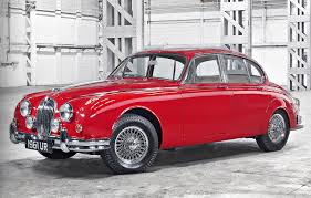 Image result for Carmen Red 1961 Jaguar