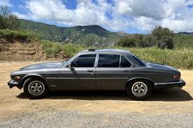 Image result for Poseidon Dark Green 1985 Jaguar