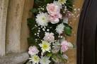 TL4965 : Flowers round church - via Daymix