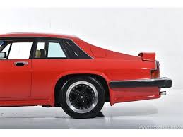 Image result for Sebring Red 1986 Jaguar