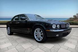 Image result for Black Cherry 2006 Jaguar