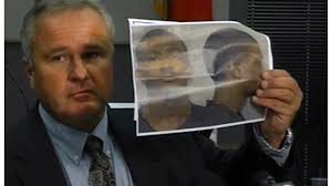 Auburn Police Chief Tommy Dawson at a press conference Sunday holds up a picture of the suspect in the shootings. (Photo: CNN.com) - 18750062_SA