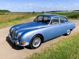 Image result for Light Blue 1968 Jaguar