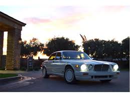 Image result for Nimbus White 1987 Jaguar