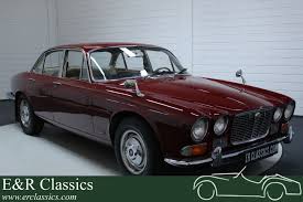 Image result for Burgundy 1983 Jaguar
