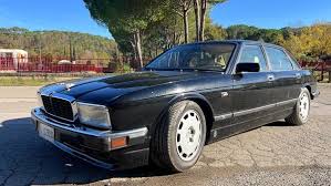 Image result for Black Cherry 1991 Jaguar