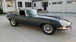 Image result for Dark Green 1959 Jaguar