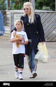 Image result for Queen B by Bumbleride $428 Gwen Stefani and Gavin Rossdale with Kingston and Zuma at the LA zoo