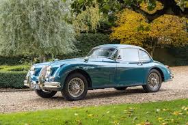 Image result for Silver Blue 1959 Jaguar