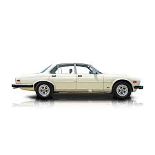 Image result for Nimbus White 1987 Jaguar