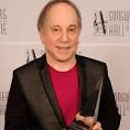 Paul Simon will close this