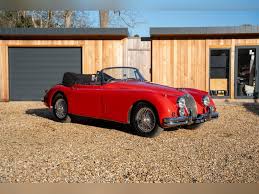 Image result for Carmen Red 1961 Jaguar