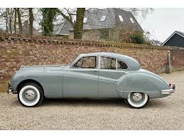 Image result for Silver Gray 1959 Jaguar
