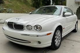 Image result for White Onyx 2002 Jaguar