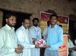 Khawar Raza (Toppper GHSS Bara Ghar) receiving from Dr Muhammad Anwar Ch - dsc00864