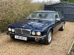 Image result for Black Cherry 1991 Jaguar