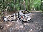 A Ford Fiesta burnt out in - via Daymix