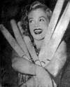 marilyn monroe white sox bats. Marilyn Monroe holding baseball bats. - marilynmonroe_whitesox_bats