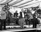 From left to right, the musicians shown are Bert Murray (trombone), - via Daymix